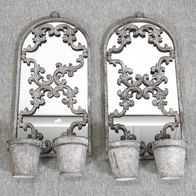 Lot 365 - A pair of metal garden mirrors