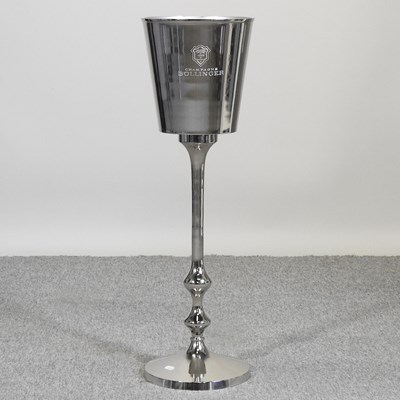 Lot 458 - A metal wine cooler on stand