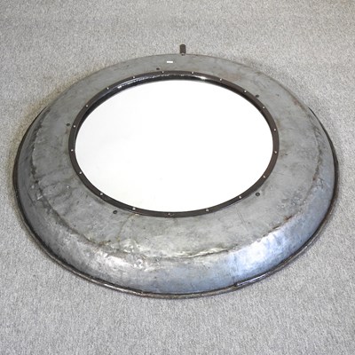 Lot 401 - A large industrial style wall mirror