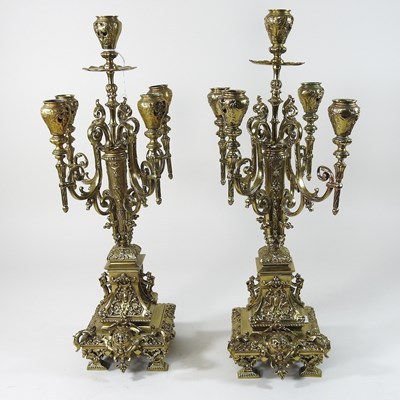 Lot 152 - A pair of brass candelabra