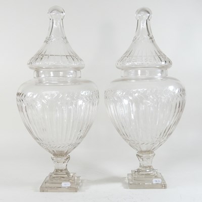 Lot 236 - A pair of cut glass lidded jars