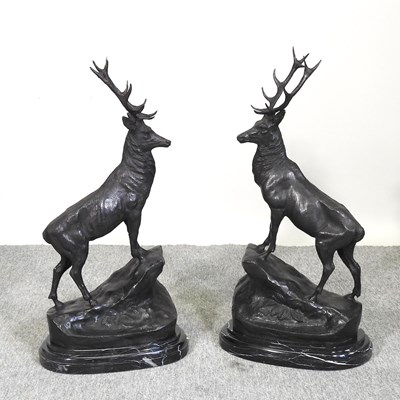 Lot 485 - A pair of bronze models of stags