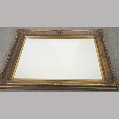 Lot 119 - A large gilt framed wall mirror
