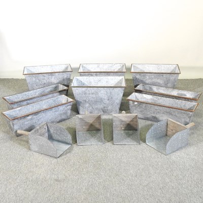 Lot 316 - A set of four zinc planters