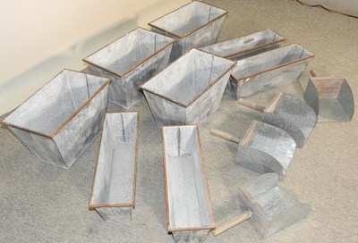 Lot 316 - A set of four zinc planters