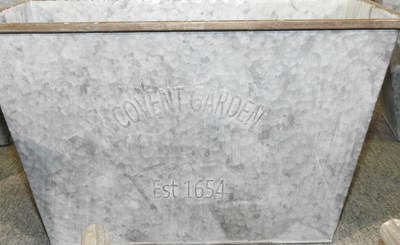 Lot 316 - A set of four zinc planters