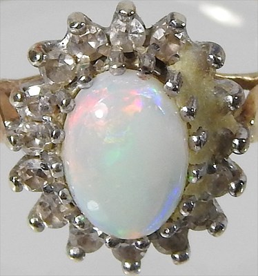 Lot 38 - A 9 carat gold opal cluster ring