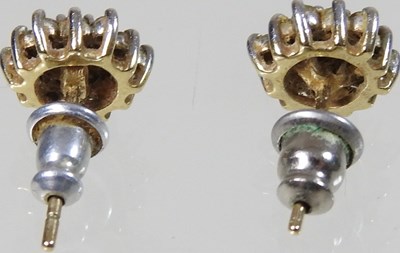 Lot 95 - A pair of 18 carat gold pendant earrings