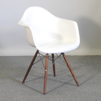 Lot 615 - An Eames style chair