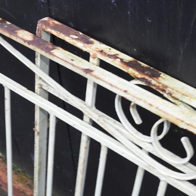 Lot 9 - A pair of French grey painted wrought iron garden gates