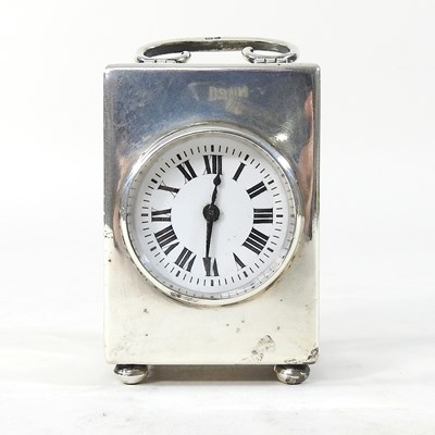 Lot 90 - A miniature silver carriage clock