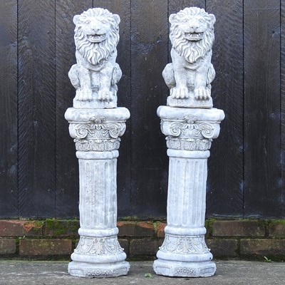 Lot 317 - A pair of reconstituted stone lions