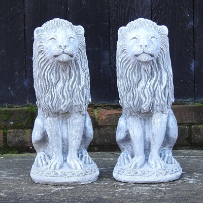 Lot 301 - A pair of reconstituted stone lions