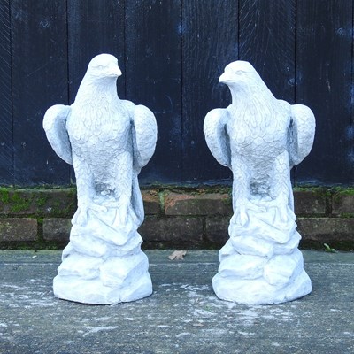 Lot 306 - A pair of reconstituted stone eagles