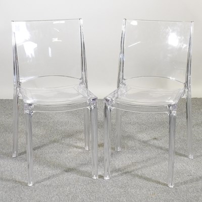 Lot 601 - A pair of perspex ghost chairs