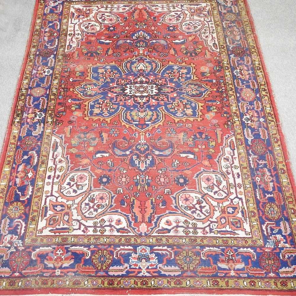 Lot 194 - A woollen carpet