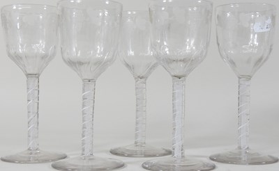 Lot 23 - A set of five double series opaque twist wine glasses