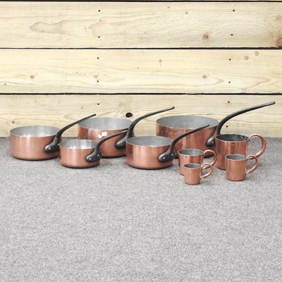 Lot 118 - A set of five graduated copper saucepans