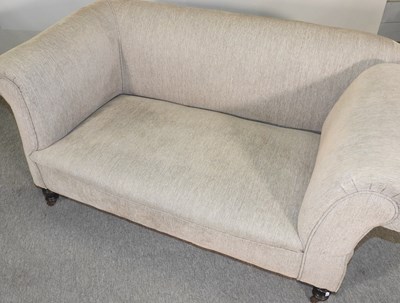 Lot 563 - A 1920's drop end chesterfield sofa