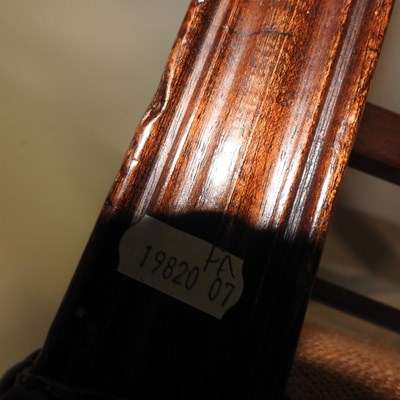 Lot 28 - A Georgian style leather upholstered wing armchair