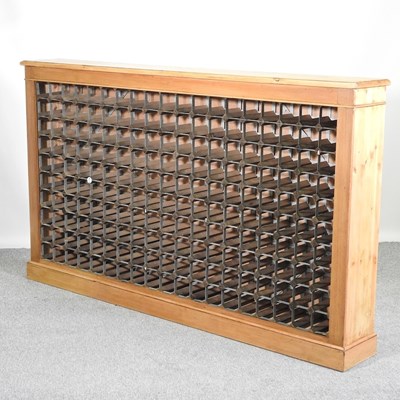 Lot 385 - A large pine bespoke made wine rack