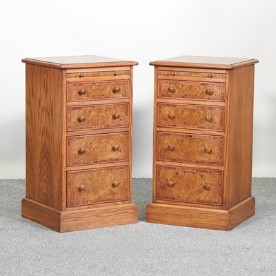 Lot 490 - A pair of burr oak bedside chests