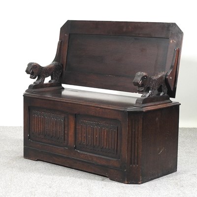 Lot 582 - An oak monk's bench