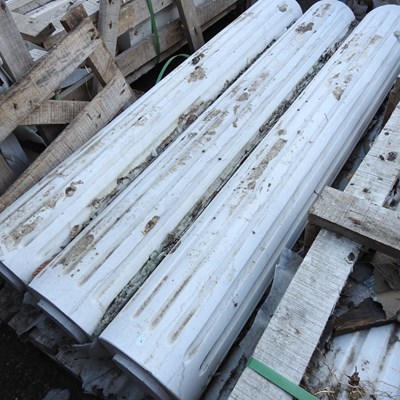 Lot 655 - A set of three marble columns