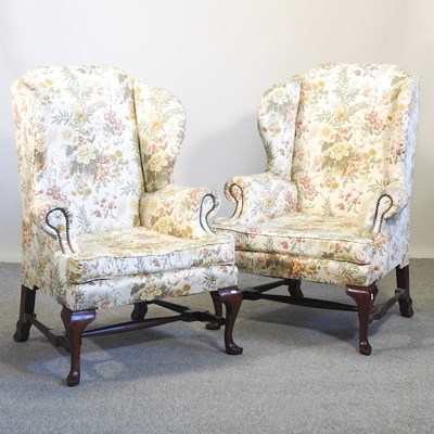 Lot 436 - A pair of Georgian style wing armchairs
