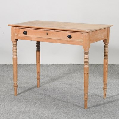 Lot 406 - An antique pine side table