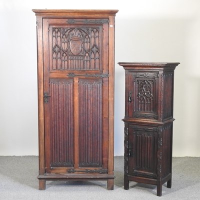 Lot 496 - A 19th century carved oak cabinet