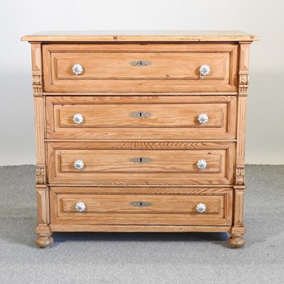 Lot 412 - A continental pine secretaire chest
