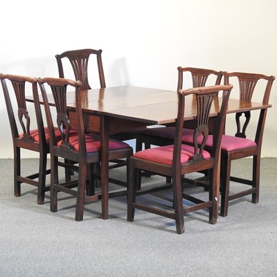 Lot 503 - A George III mahogany drop leaf dining table