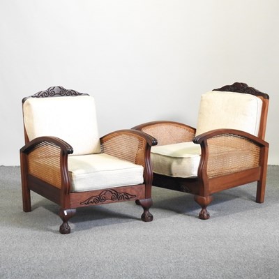 Lot 498 - A mid 20th century three piece bergere suite