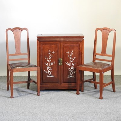 Lot 486 - A Chinese hardwood side cabinet