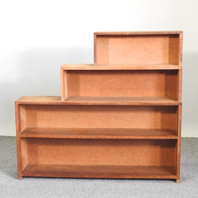 Lot 379 - An Art Deco light oak open bookcase