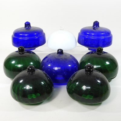 Lot 261 - A collection of eight glass lamp fonts