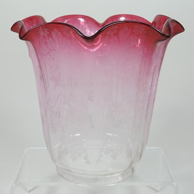 Lot 154 - A red and clear glass oil lamp shade
