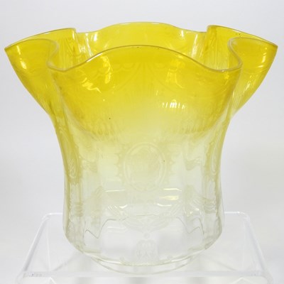 Lot 206 - A yellow glass oil lamp shade