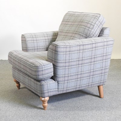 Lot 493 - A Marks & Spencer grey check upholstered armchair