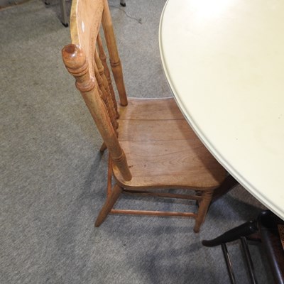 Lot 66 - A pine and painted circular dining table