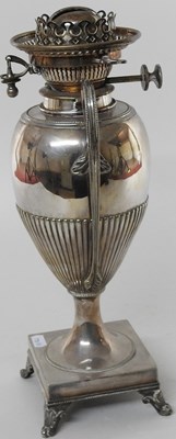 Lot 12 - An early 20th century silver plated oil lamp base