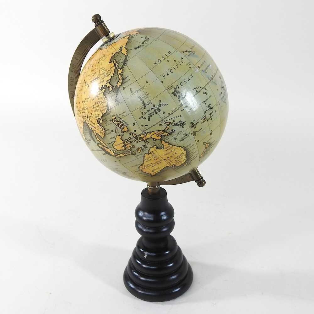 Lot 207 - A terrestrial globe on stand