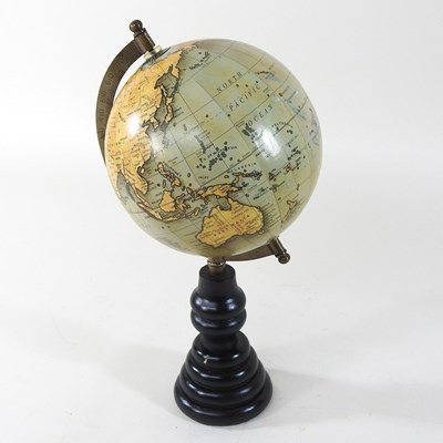 Lot 207 - A terrestrial globe on stand