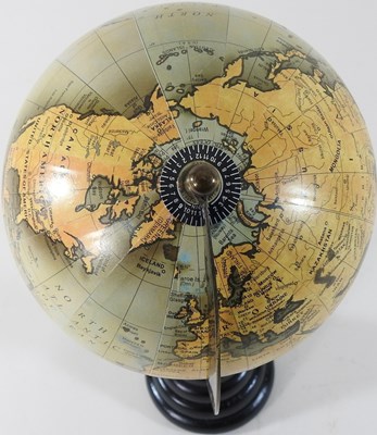 Lot 207 - A terrestrial globe on stand