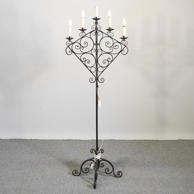 Lot 401 - A black painted iron candelabra
