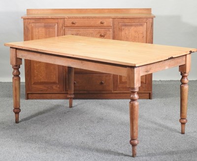 Lot 67 - A modern pine dining table
