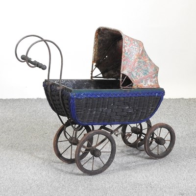 Lot 395 - A vintage doll's pram