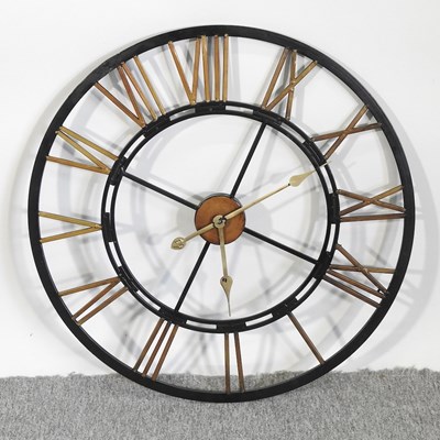 Lot 345 - A modern black painted metal wall clock