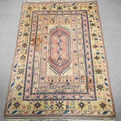 Lot 526 - A Persian woollen rug